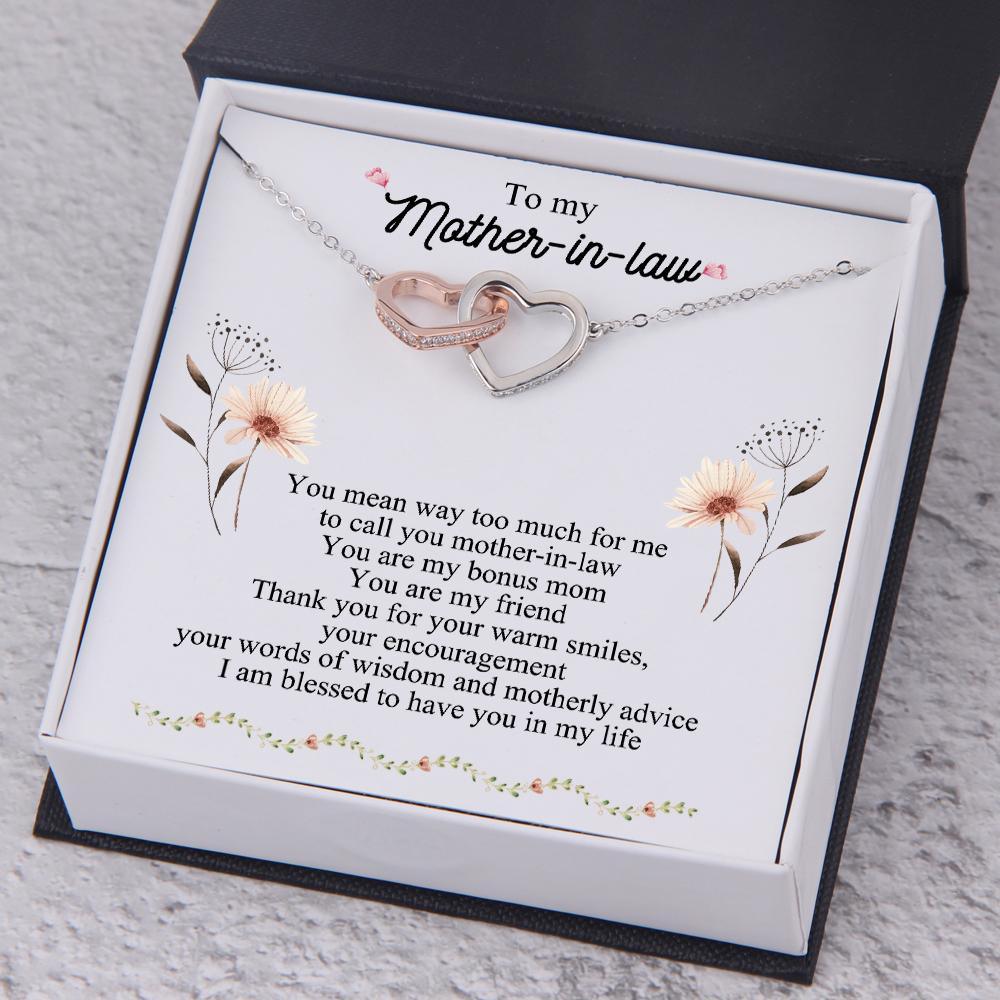 https://giftsholder.com/cdn/shop/products/interlocked-heart-necklace-to-my-mother-in-law-thank-you-for-your-warm-smiles-augnp19001-gifts-holder-3-11991985815713_1200x.jpg?v=1693272958